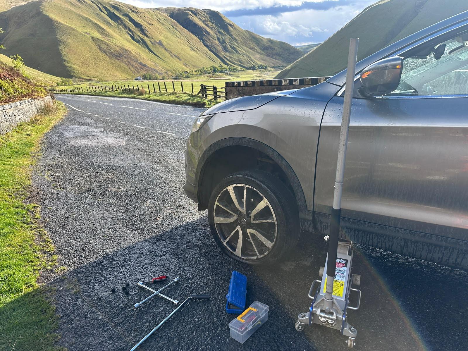 Roadside tyre replacement in a remote Highland location